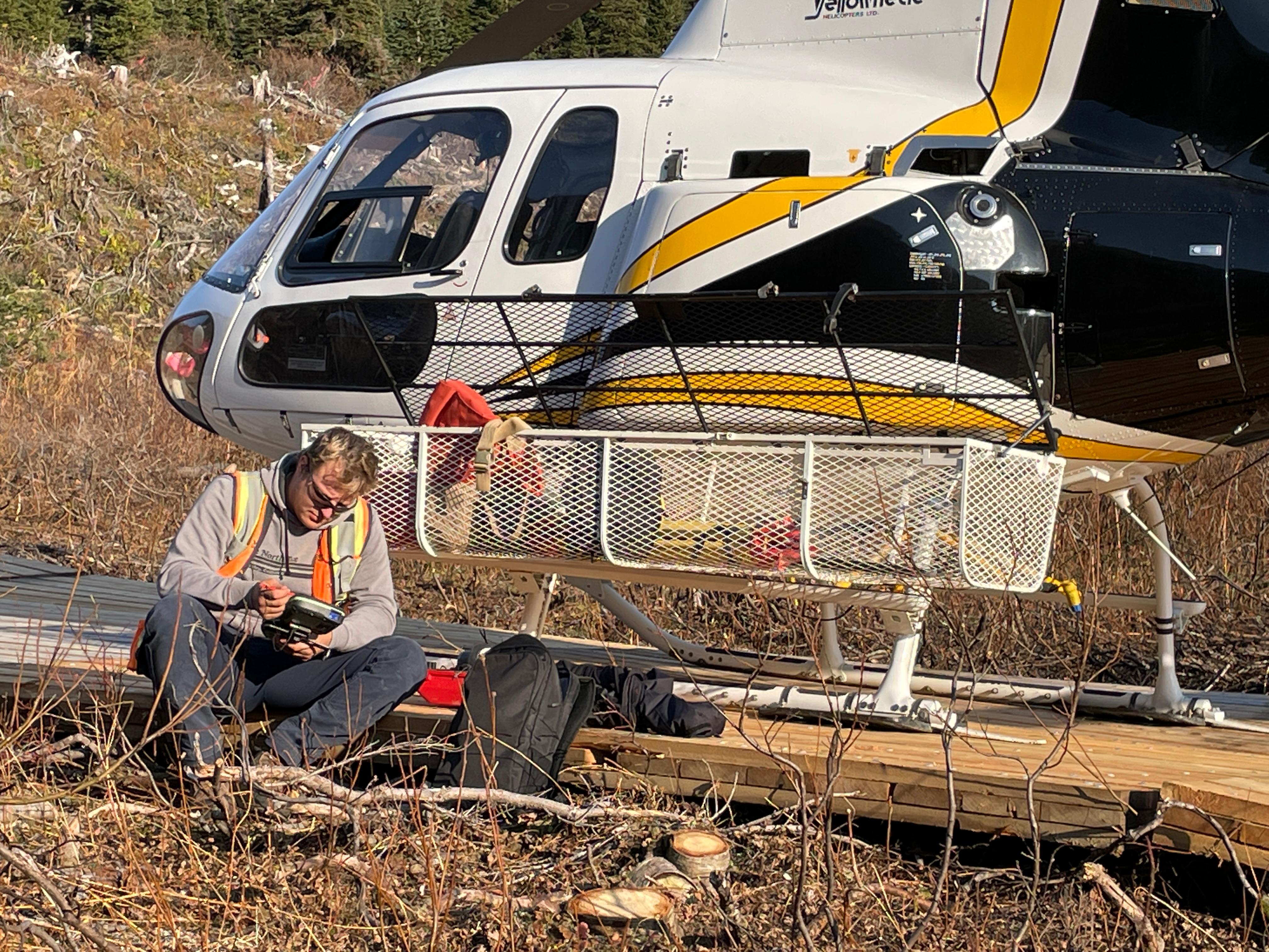 Survey crew performing field calculations